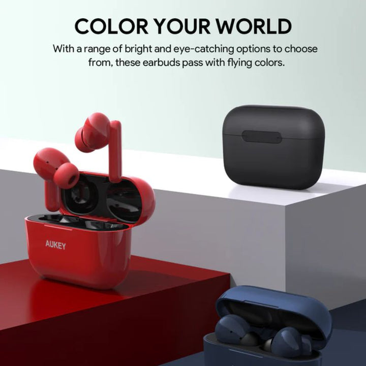 Three pairs of Aukey Powerful Lightweight Earbuds (EP-M1S) are shown in red, black, and blue. The red earbuds are open upright, the black case is closed, and the blue case is slightly open. Enjoy touch control and vibrant color choices.