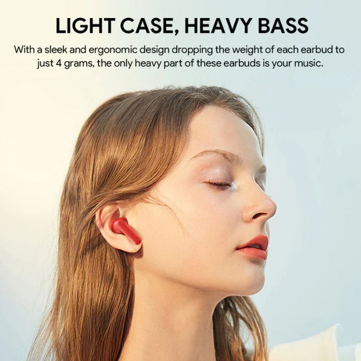 A young woman with long brown hair wears Aukey’s Powerful Lightweight Earbuds - AUKEY EP-M1S in pink, eyes closed and relaxed. Above her, bold text reads: “Light Case, Heavy Bass,” highlighting their lightweight design and deep bass.