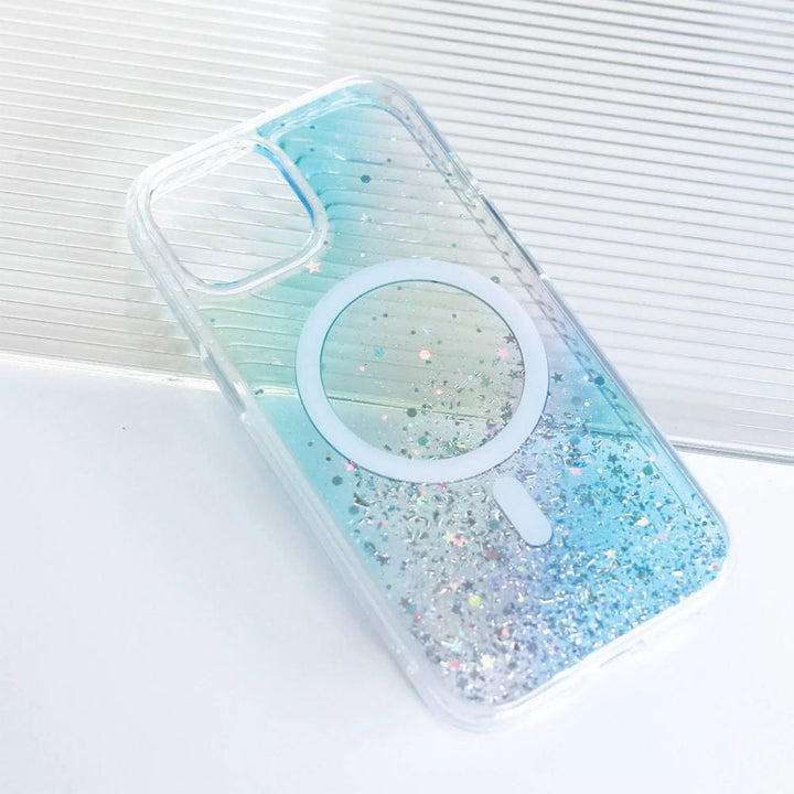 Introducing the Bryten by Raptic iPhone 15 Series Starburst MagSafe Case, a clear smartphone case with silver glitter and a circular MagSafe ring in the center, featuring seamless MagSafe integration, designed specifically for your iPhone 15 Pro Max.