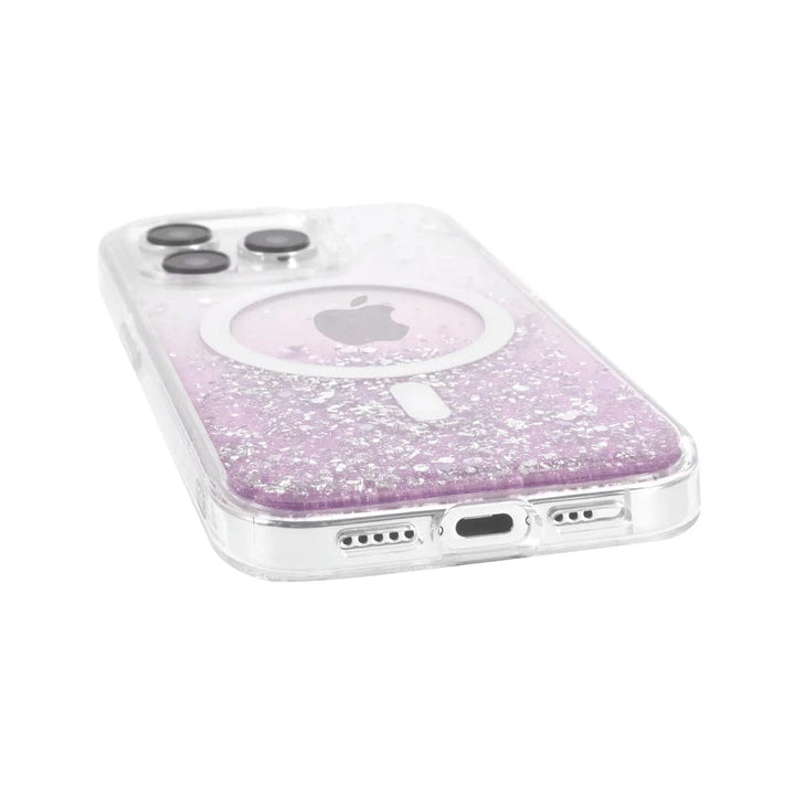 The Bryten by Raptic iPhone 15 Series Starburst MagSafe Case, featuring a clear, reflective iridescent design with glitter accents and a purple background, is shown from an angle. The image highlights the seamless MagSafe integration, camera, and charging port at the bottom.