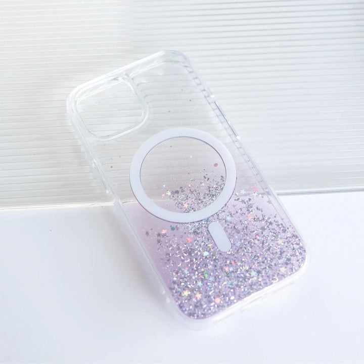 The Bryten by Raptic iPhone 15 Series Starburst MagSafe Case features seamless MagSafe integration with a white ring in the center, glitter at the bottom, and a reflective iridescent design set against a pristine white background.