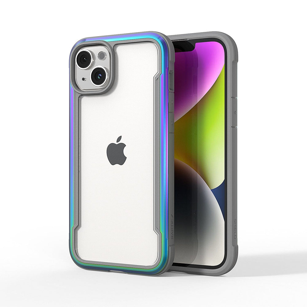 Two iPhones are depicted: one showing the back with an Apple logo and dual cameras, and the other showing the front with a colorful display. Both are enclosed in iridescent Raptic Shield iPhone 15 Shield Cases that meet MIL-STD-810G standards for 3-metre drop protection.