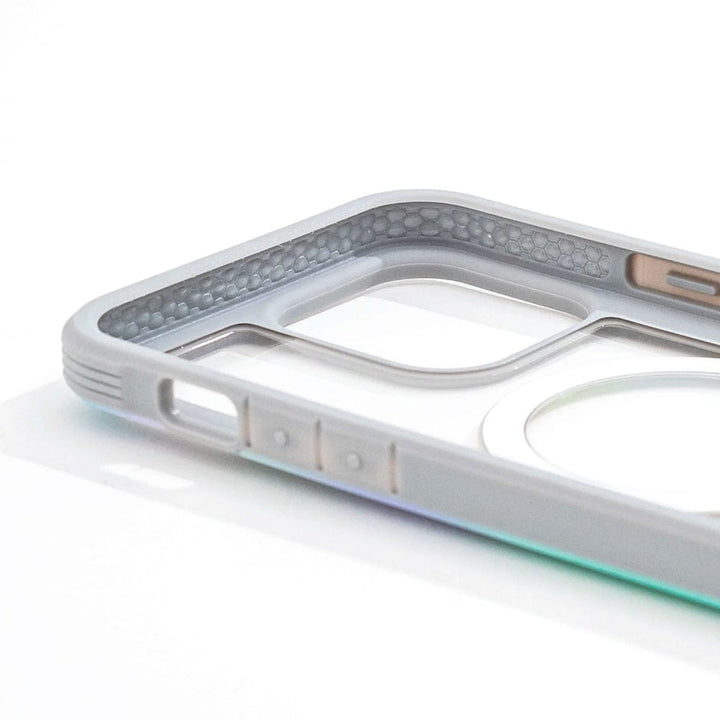 Close-up of the Raptic Shield 2.0 iPhone 15 MagSafe Case by Raptic, featuring a transparent design with reinforced edges and an inner honeycomb pattern. The case is compatible with MagSafe accessories and offers precise cutouts for buttons, camera, and charging port. Additionally, it provides 3-metre drop protection.