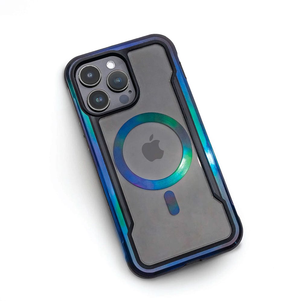 A smartphone with a triple camera setup on the back is encased in the Raptic Shield 2.0 iPhone 15 MagSafe Case by Raptic, featuring a shiny, circular design with a keyhole-like symbol and an Apple logo, offering 3-metre drop protection.