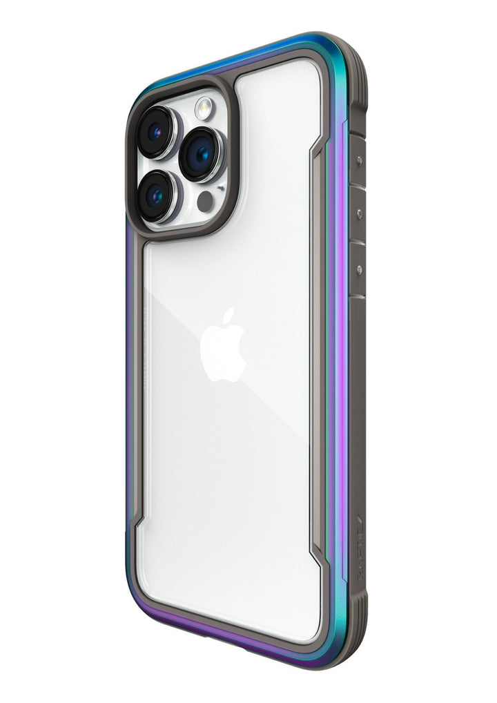 A clear and iridescent Raptic Shield iPhone 15 Shield Case, with reinforced edges and a cutout for the camera lenses, meets MIL-STD-810G Standards and provides 3-metre drop protection.