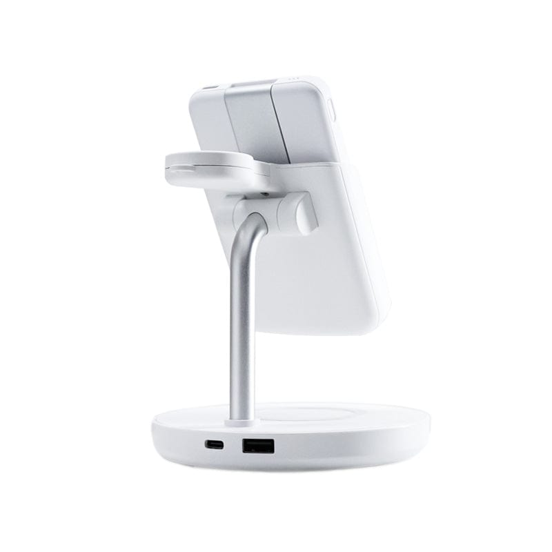 The Urban 6-in-1 MagSafe M6 Wireless Charger Station by Urban is a white wireless charging stand featuring a circular base with two ports for charging and connectivity. It has an adjustable silver arm that extends to support smartphones vertically, compatible with iPhone-compatible magnetic cases, adding convenience on a plain white background.