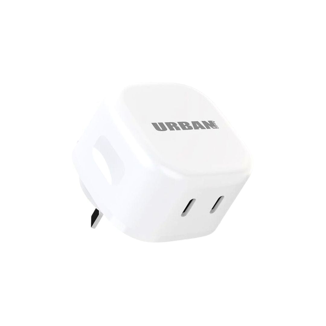 A white rectangular USB-C charger with two ports, "URBAN" printed on it, featuring GaN technology for efficient charging.