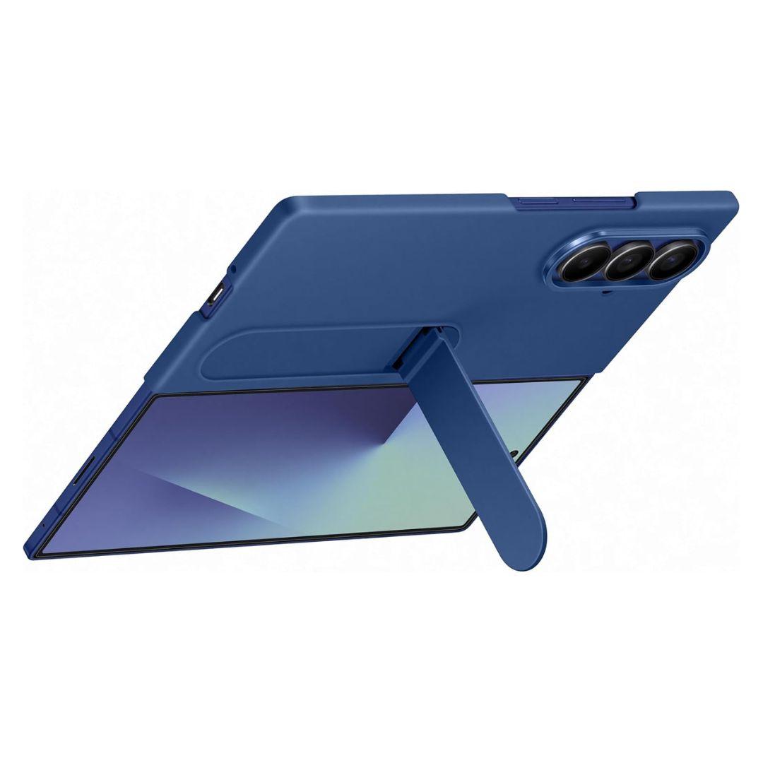 The Samsung Galaxy Fold 7 Silicone Case in blue features a built-in kickstand to support landscape viewing. This slim, lightweight case offers soft-touch protection and highlights the phone's triple rear camera against a plain white background.