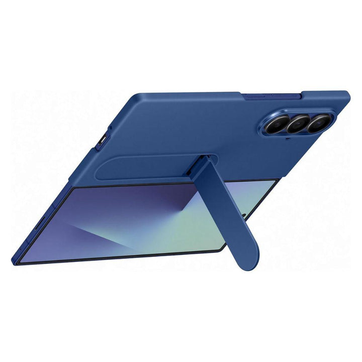 The Samsung Galaxy Fold 7 Silicone Case in blue features a built-in kickstand to support landscape viewing. This slim, lightweight case offers soft-touch protection and highlights the phone's triple rear camera against a plain white background.