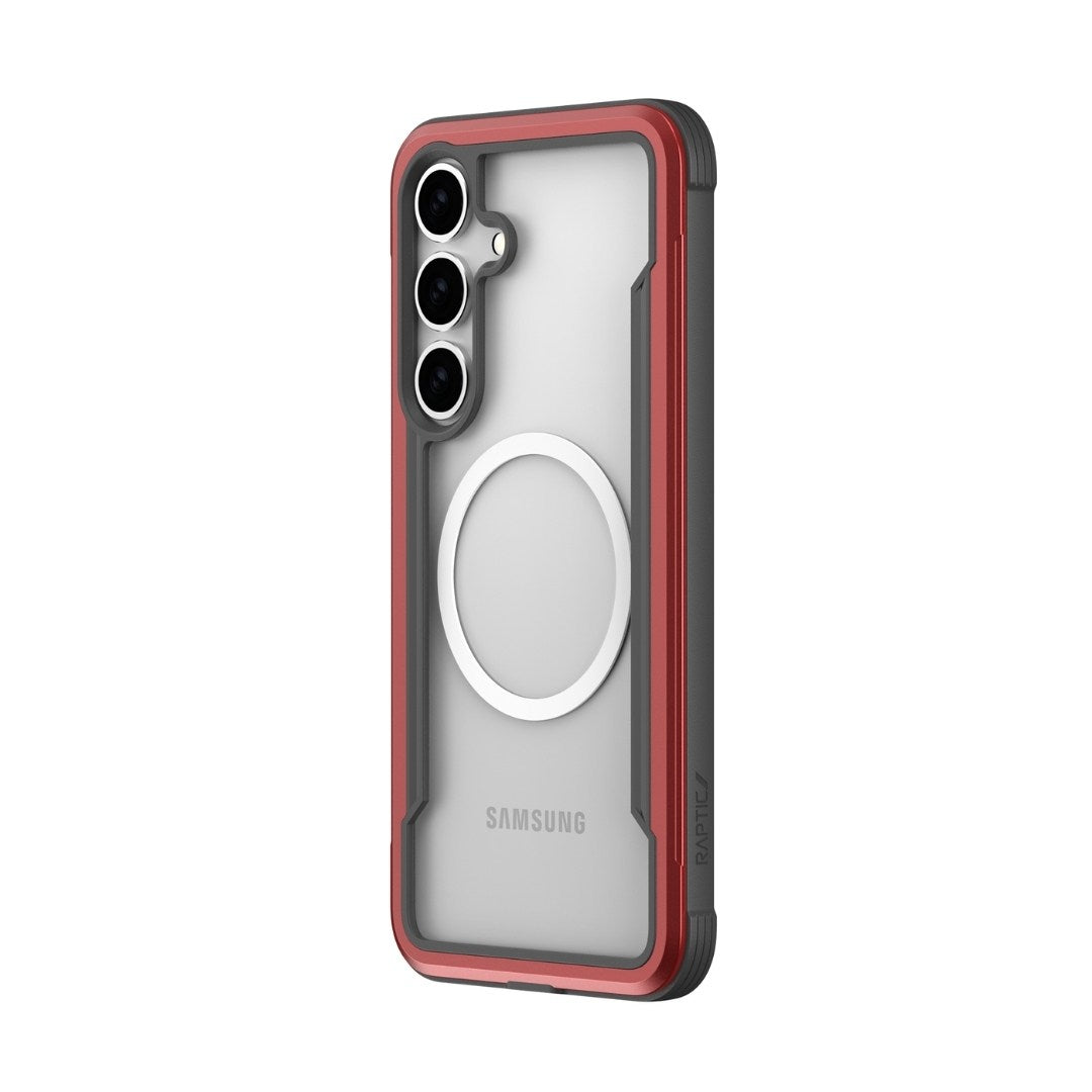 Introducing the Raptic Samsung S25 Shield Case, featuring a transparent back with a striking red border, circular MagSafe-like element, and precise cutouts for three camera lenses. Built for ruggedness, it offers military-grade protection with robust black corners and superior shock absorption.