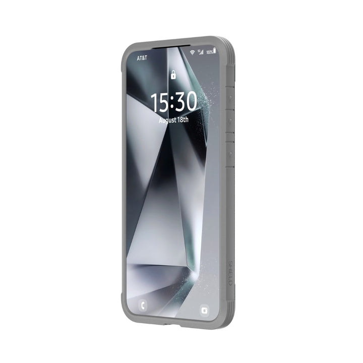 The Samsung S25, in a rugged gray Raptic Shield case, offers military-grade protection and sleek design. The lock screen shows 15:30 on August 18th with "AT&T" at the top left and Wi-Fi/battery icons on the right. The background is a geometric black-and-white abstract design.