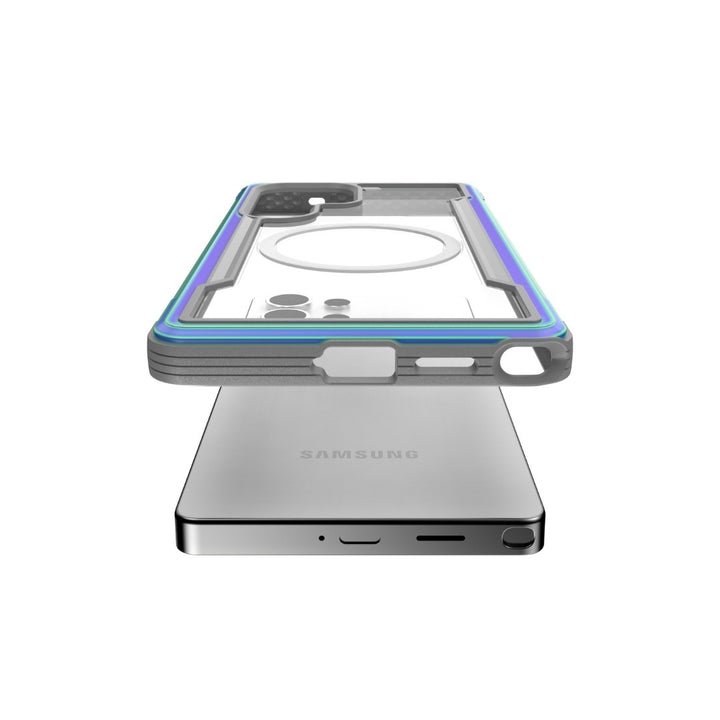 A transparent Raptic Shield Case for the Samsung S25 hovers above the smartphone, featuring a magnetic ring, lens cutouts, and colored bumper. This sleek design offers military-grade protection while the phone rests flat, showcasing its camera section and side buttons on a white backdrop.