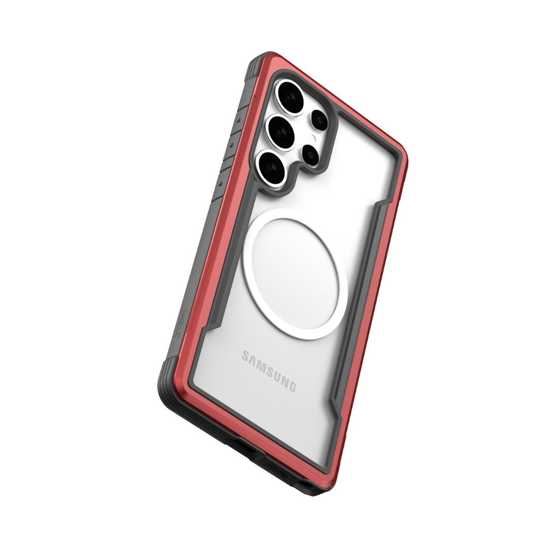 Introducing the Raptic Samsung S25 Shield Case, a rugged wonder with red-edged military-grade protection. Its clear back showcases a sleek metal ring and offers superb shock absorption, while the top-left four-lens camera captures every moment perfectly.