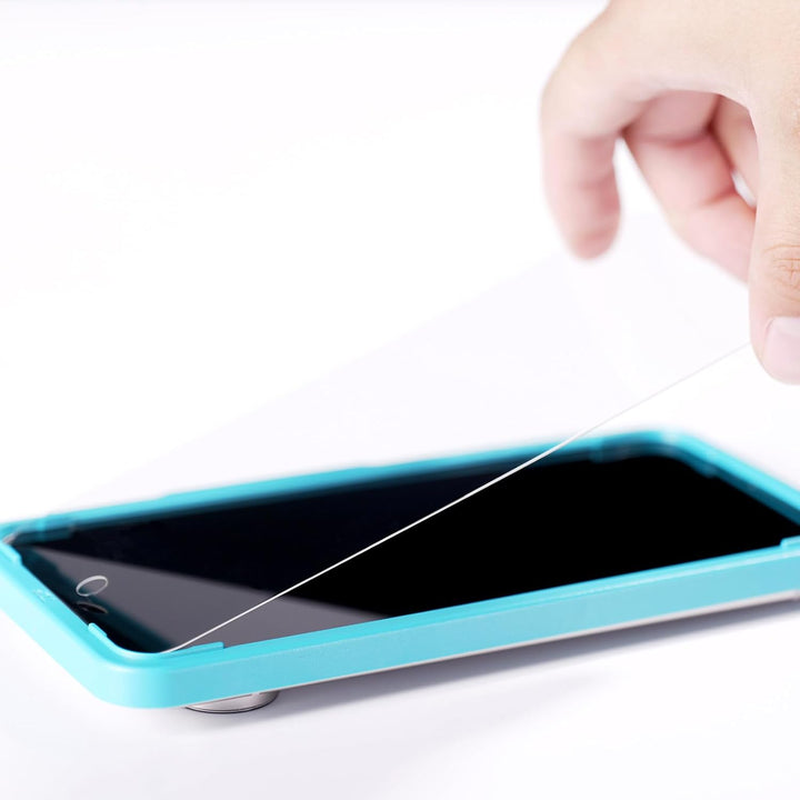 A hand peels a clear MobileTechnica Google Pixel 10 5G screen protector from a turquoise-cased phone, ideal for highlighting the 2-pack tempered glass set with camera lens protection in an engaging A+ module or carousel.