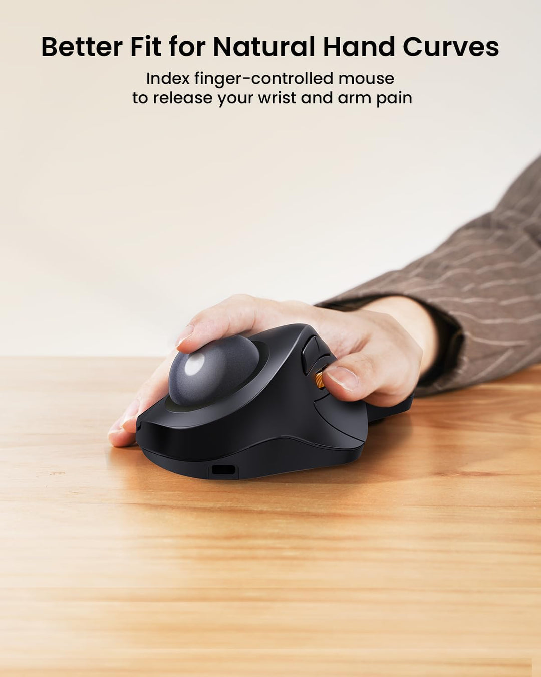 A right hand rests on the MobileTechnica ProtoArc EM03 Wireless Trackball Mouse in Mac-Gray. This rechargeable ergonomic Bluetooth mouse, featuring an adjustable angle and gray trackball, supports natural hand curves and helps ease wrist pain.