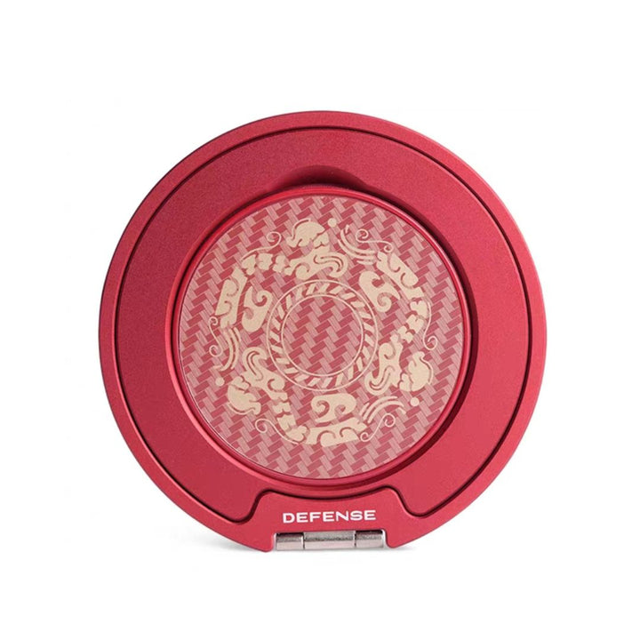 The Magnetic Ring with Pop holder - Raptic Defeme by MobileTechnica features a red circular design labeled “DEFENSE,” displaying light and medium beige tones in cloud and houndstooth patterns—a chic accessory for your phone, like a stylish vanity piece.