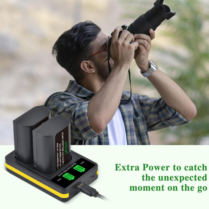 A bearded man takes photos outdoors as a MobileTechnica dual charger powers two DMW-BLK22 replacement batteries for Panasonic S5ii. Green displays show charge status. Text: "Extra Power to catch the unexpected moment on the go.