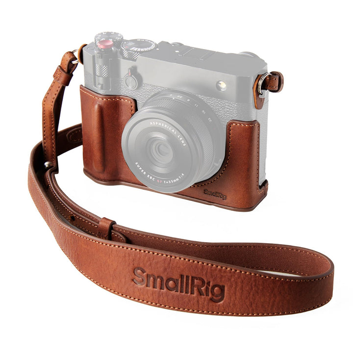 The SmallRig GFX100RF Leather Case Kit in brown, with a matching shoulder strap, thumb pad, and shutter button cap, offers stylish protection and comfort for the FUJIFILM GFX100RF while showcasing its ergonomic grip and textured details.
