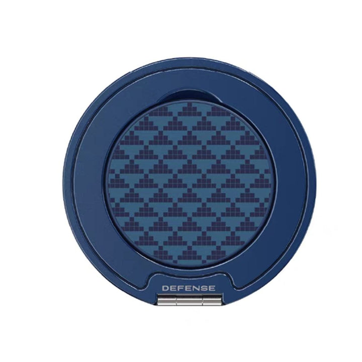 The MobileTechnica Magnetic Ring with Pop holder - Raptic Defeme features a round blue compact case with pixelated dark and light blue shapes, a silver hinge, "DEFENSE" in white, and doubles as a magnetic phone stand.