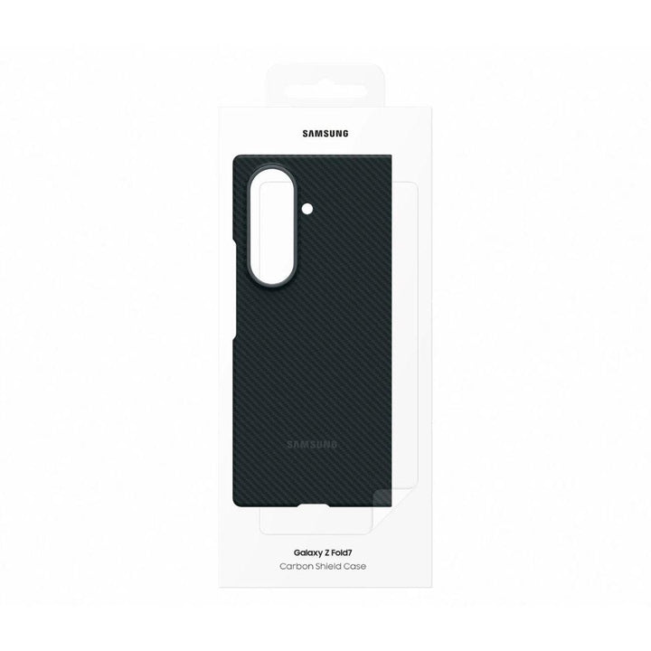 A Samsung Galaxy Fold 7 Carbon Shield Case in original white packaging with a clear window shows the slim, black carbon fiber case with precise cutouts. The Samsung logo is on top, and product details are listed below.
