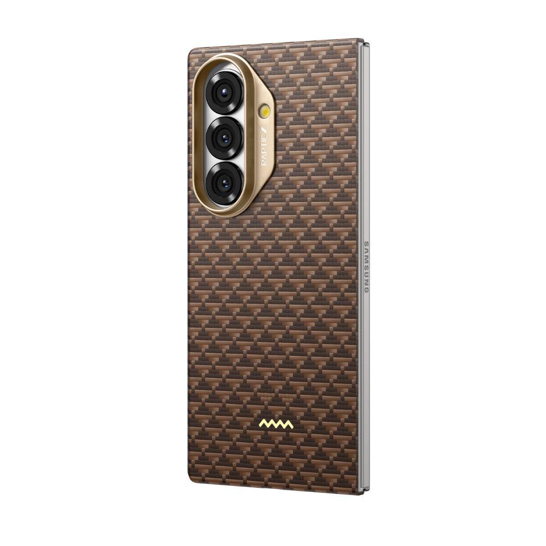 The RAPTIC Samsung Galaxy Fold 7 Skin Case in Humble Desert features a brown woven-texture pattern, metallic edges for style and protection, three vertically aligned camera cutouts in a gold module, and a small gold logo at the back’s bottom.