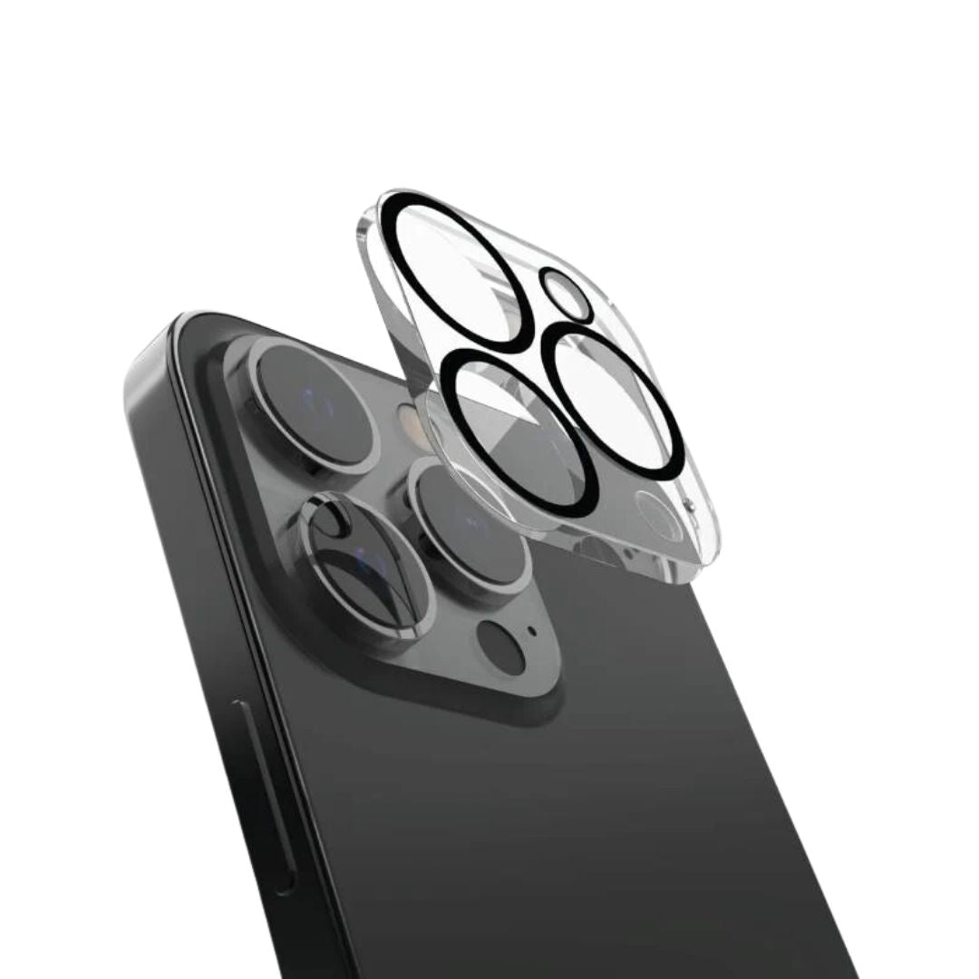 The Raptic iPhone 16 Camera Lens Protector is displayed being carefully positioned over the three lenses of a sleek black phone. This transparent cover features black rings that align flawlessly, ensuring ultra-clear visibility. Set against a simple white background, the emphasis is on the smartphone and its elegant protection solution by Raptic.