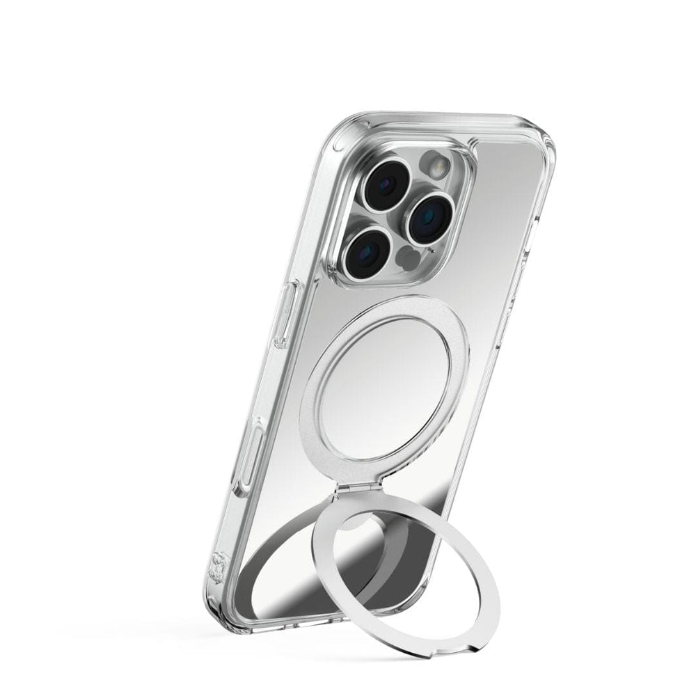 The Raptic Air Stand Mirror with Magsafe for iPhone 16 Pro is displayed, highlighting a transparent design and a centrally positioned built-in metallic circular ring holder on the back. This multifunctional phone case, holding an iPhone 16 Pro with a triple camera setup, offers both simplicity and versatility for holding or serving as a stand.