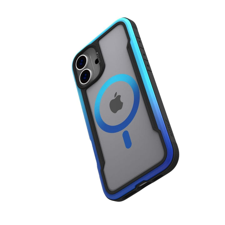 The Raptic Shield 2.0 MagSafe for iPhone 16 Plus, a smartphone encased in a rugged, blue and black protective case, is shown against a white background. The phone’s back features a transparent section displaying the Apple logo and an IML Process MagSafe Ring. The dual camera lenses and flash are visible in the top left corner of the lightweight build from Raptic.