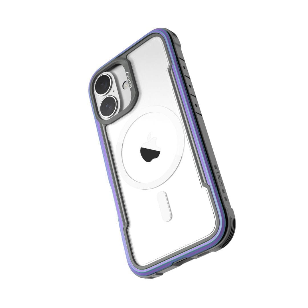 A Raptic Shield MagSafe Case for iPhone 16 is shown at an angle, featuring a clear phone case with a gray and purple border. The transparent back allows the Apple logo of the enclosed iPhone to be visible. The case has precise cutouts for the dual rear cameras, side buttons, and ports. This rugged Raptic Shield case meets MIL-STD-810G standards for durability and protection.