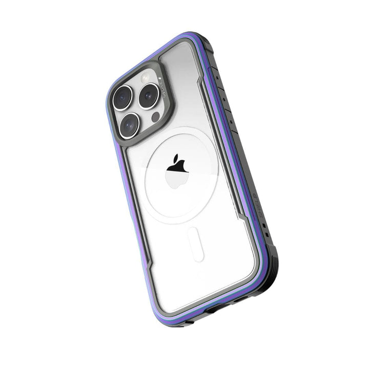 The Raptic Shield MagSafe Case for iPhone 16 Pro Max features a protective dual-layer design, showcasing three large camera lenses on the upper left and a visible Apple logo at the center. This case includes a clear back with purple accents, rugged edges for enhanced grip, and offers 3-metre drop protection.