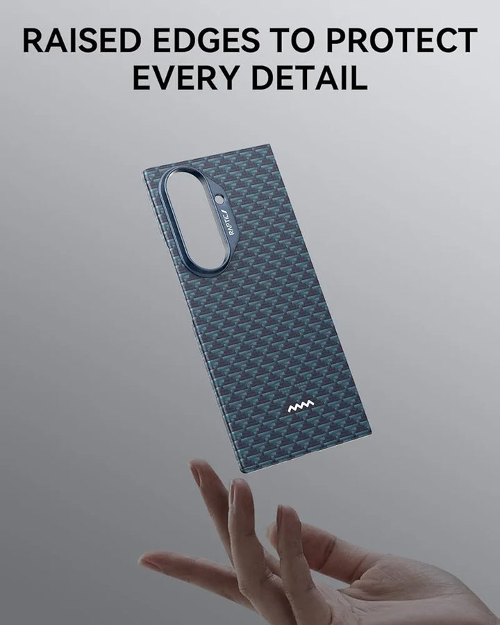 A blue patterned RAPTIC Samsung Galaxy Fold 7 Skin Case—Profound Navy—floats above an outstretched hand, showcasing raised edges and hinge protection. Bold text reads, "RAISED EDGES TO PROTECT EVERY DETAIL" on a light gray background.