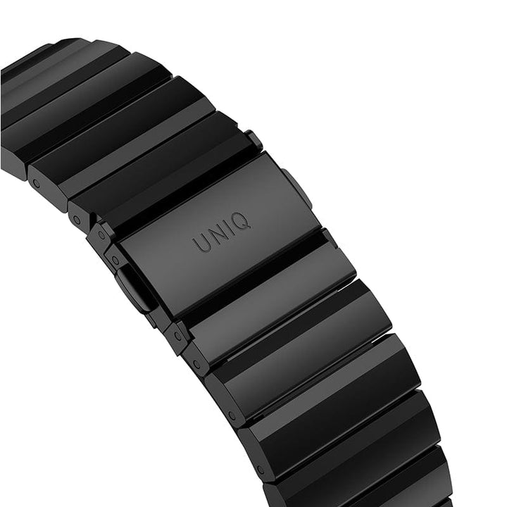 A black UNIQ watch band with an adjustable length.